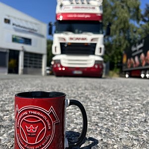 Bild zeigt Heinrichs Thermoliner Kaffeetasse mit Logo